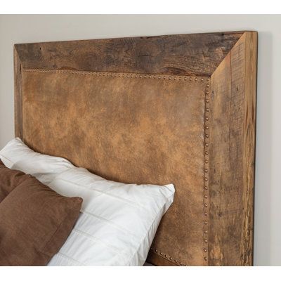 The Gibson headboard is quality craftsmanship at its finest! This unique, one-of-a-kind headboard is made from old, restored Barnwood. We use wood salvaged from older, local barns, so no two beds are alike! The wood frames are constructed by the region's finest woodworkers. Warmth and softness are added with the upholstered inset. With easy assembly, you will have your headboard put together in just minutes. Every knot and imperfection of the reclaimed lumber used adds to the character of each h Upholstered Panel Headboard, Headboard Upholstered, Leather Headboard, Reclaimed Lumber, Upholstered Panels, Panel Headboard, Bedroom Headboard, Adjustable Beds, Bedroom Furniture Beds