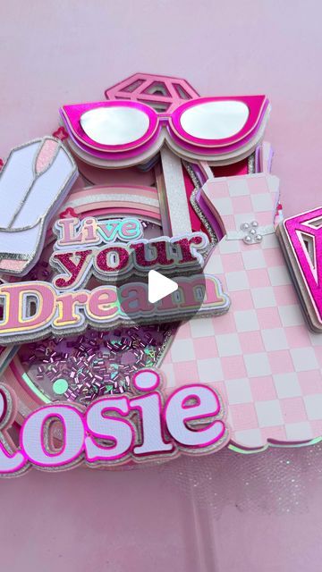 Roisin | Cricut UK Community Leader | Paper Crafter | Tutorials on Instagram: "Barbie inspired Cake Topper made with Cricut Design Space images 🎀 

Drop a 💕 if you would like me to add this project to my design space profile......

#sweetevedesigns #cricutuk #caketopper #shakercaketopper #barbie #barbiemovie #barbieinspired #barbiedecor #barbieparty #barbiecaketopper #barbiecake #cricutcaketopper #cricutmade #cricutproject #pinkcaketopper #caketopperdesign #caketopperideas #caketoppershaker #caketoppertutorial #cricutmade #cricuttutorial #caketoppertutorial 

✨Cutting Machine @cricut_uk @cricut 
✨Glues @beaconcreates @bearlyarts 
✨Cardstock @12x12cardstock @cricut_uk @hobbycrafthq @therangeartscrafts" Pink Cake Toppers, Cricut Cake, Barbie Inspired, Cake Topper Tutorial, Barbie Cake, Space Images, Barbie Party, Cricut Design Space, Cricut Tutorials