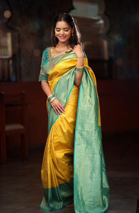 Yellow And Blue Silk Saree, Yellow With Blue Silk Saree, Yellow Colour Saree, Yellow Silk Saree, Kerala Wedding Saree, Teal Blue Blouse, Saree Pins, Saree Pose, Indoor Shoot