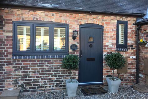 Exterior Black Windows, Anthracite Grey Windows, Black Windows Exterior, Exterior Door Colors, Cottage Front Doors, Brick Cottage, Black Window Frames, House Front Door Design, Composite Doors