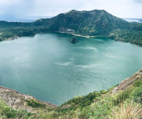 Standing tall on the island of Luzon 🌴, Taal Volcano 🌋 is a breathtaking sight to behold in the Philippines 🇵🇭. This active volcano, nestled in the heart of Taal Lake, is a popular destination for adventure-seekers and nature lovers alike 🌟. With its stunning landscapes and serene surroundings, Taal Volcano is a must-visit destination for anyone traveling to the Philippines 🗺️. #TaalVolcano #PhilippinesTourism #VolcanoAdventures #NatureEscape #TravelThePhilippines 📸 Taal Volcano, Philippines Tourism, Active Volcano, Stand Tall, In The Heart, Volcano, Nature Lover, Philippines, Lake