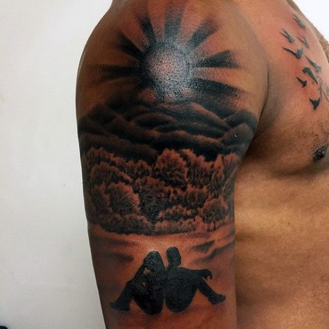 Mens Rising Sun Tattoo With Couple In Background On Arm Sunrise Tattoo Sleeve, Sun Tattoo Men Shoulder, Upper Arm Sun Tattoo, Shoulder Cap Tattoo Men, Sunrise Tattoo Rising Sun, Upper Shoulder Tattoo Men Ideas Design, Sun Rise Tattoo, Upper Shoulder Tattoo Men, Sun Tattoo Shoulder