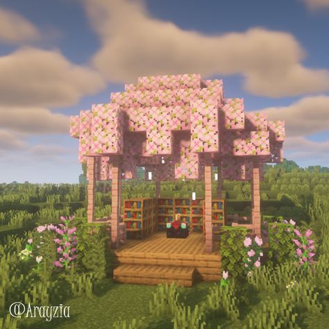 Cute Minecraft Ideas Outside, Cherry Blossom Enchantment Room, Minecraft Wells Designs Cute, Cute Minecraft Date Builds, Minecraft Enchanting Gazebo, Outside Enchanting Area Minecraft, Minecraft Cherry Blossom Lamp Post, Pink Gazebo Minecraft, Pink Horse Stable Minecraft