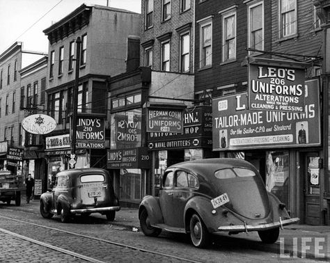 Cars parked in front of four Navy uniform stores on Sand Street, Brooklyn. March 1946. Photographer: Andreas Feininger (via LIFE) #memorymonday #bsre_keepingitlocal Navy Uniform, Navy Uniforms, Pt Cruiser, Vintage New York, White Photos, Brooklyn New York, Street Scenes, Historical Photos, Vintage Photography