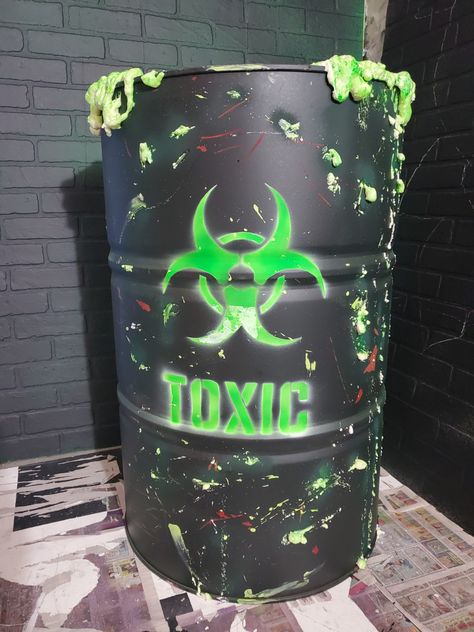 DIY Halloween props idea of Toxic waste barrel for photoshoot set or school project Halloween Barrel Ideas, Toxic Waste, Diy Cardboard Barrel, Halloween Toxic Waste, Toxic Barrel, Halloween Toxic Waste Barrel, Toxic Waste Barrel, Diy Toxic Waste Barrel, Ghost Busters Birthday Party