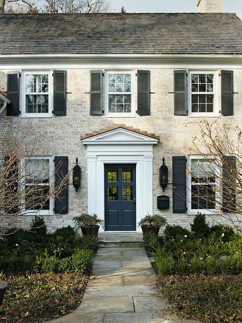 Adding shutters brings a historical and colorful touch to your home! More curb appeal ideas:  http://www.bhg.com/home-improvement/exteriors/curb-appeal/add-exterior-color/?socsrc=bhgpin100413shutterideas&page=6 Cara Brown Designs, House Redo, Black Shutters, White Wash Brick, Colonial Exterior, House Facade, Colonial Style Homes, Grey Exterior, Shutters Exterior