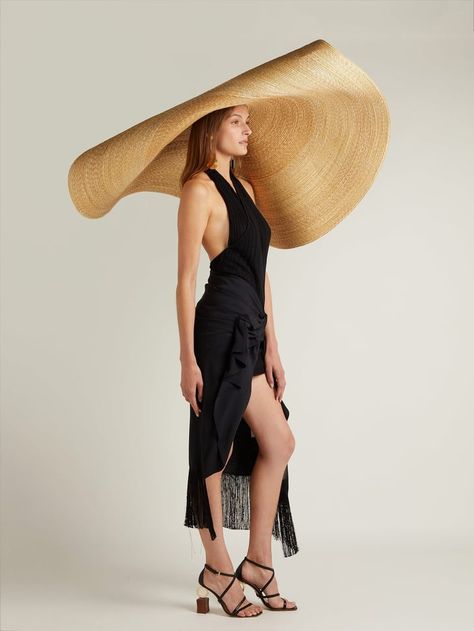 This oversized sun hat by ‘Jacquemus’ is called “Le Grand Chapeau Bomba Hat” & it deserves such an extravagant name, too! The design retails for $590 💠 Simon Porte Jacquemus (b. 16 January 1990 in Salon-de-Provence, France) is a French fashion designer & founder of the ‘Jacquemus’ fashion label. Hat Jacquemus, Sheer Wedding Dress, French Fashion Designers, Sheer Fashion, Matches Fashion, French Fashion, Celebrity Couples, Fashion Labels, Celebrity Weddings