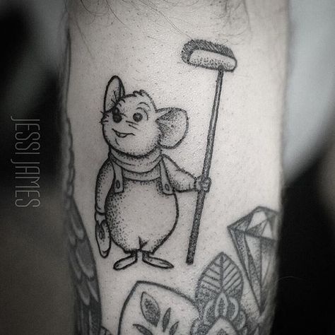 Something a bit different for me Bernard from the Rescuers! Around some older healed pieces from me on a forearm. Lots of fun this little guy #dotwork #dotworktattoo #blacktattoos #blackwork #disney #disneytattoo Disney Tattoo Black And Grey, Mouse From Coraline Tattoo, Brother Sister Disney Tattoo, Cinderella Mouse Tattoo, Rescuers Tattoo, Obscure Disney Tattoo, Rescuers Disney, The Rescuers Disney, Disney Sleeve Tattoos