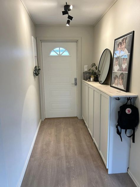 Ikea tips, hacks and more! | This for you guys that have a long and narrow hallway… we used billy/oxberg cabinets with doors as shoe storage, painted them in the same color as t... Ikea Havsta Hallway, Hallway With Cupboards, Front Entryway Ideas Shoe Storage, Ikea Narrow Hallway, Ikea Billy Hallway, Storage In Narrow Hallway, Built In Shoe Storage Entrance, Storage For Narrow Hallway, Hallway Narrow Storage