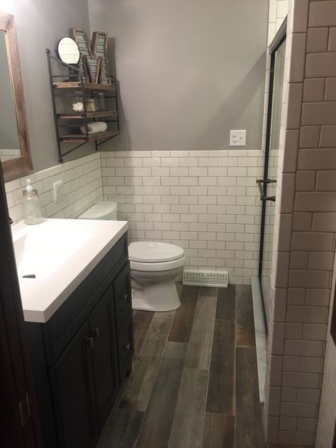 Remodel: Modern Rustic bathroom with white subway tile and "reclaimed wood" ceramic tile floor: Small Farmhouse Bathroom, Makeover Kamar Mandi, Basement Bathroom Design, Wood Tile Bathroom, Farmhouse Bathroom Remodel, Basement Bathroom, Upstairs Bathrooms, Apartment Bathroom, Trendy Bathroom