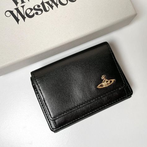 Vivienne Westwood Trifold Wallet 3318M1J Black NEW WATER ORB Description Guaranteed 100 % Authentic Product ! Condition: New Brand Vivienne Westwood color black style vintage Features tri-fold                                                                                       Visit our store: pinzou-japan Store ※ The color might be slightly different from the actual product due to the effect of light and monitor setting ※ Delivery to overseas may be delayed due to disasters, bad weather, etc., Vivien Westwood Wallet, Black Wishlist, Vivienne Westwood Purse, Wallet Aesthetic, Vivienne Westwood Wallet, Wood Wallet, Elegant Wallet, Cute Wallet, Japan Store