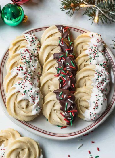 Chocolate Dipped Danish Butter Cookies - Cookin' with Mima Danish Butter Cookies Recipe, Butter Cookies Christmas, Danish Cookies, Cookie Recipe Video, Danish Butter Cookies, Chocolate Dipped Cookies, Baking Treats, Dipped Cookies, Clam Recipes