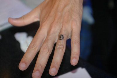 Tattoo On Ring Finger › Wedding Band Tattoo Design on Ring Finger B Letter Tattoo, Letter Tattoo On Finger, Letter B Tattoo, Finger Image, Tattoo On Finger, Wedding Band Tattoo, Small Tattoo Placement, Tattoo Finger, Letter Tattoo