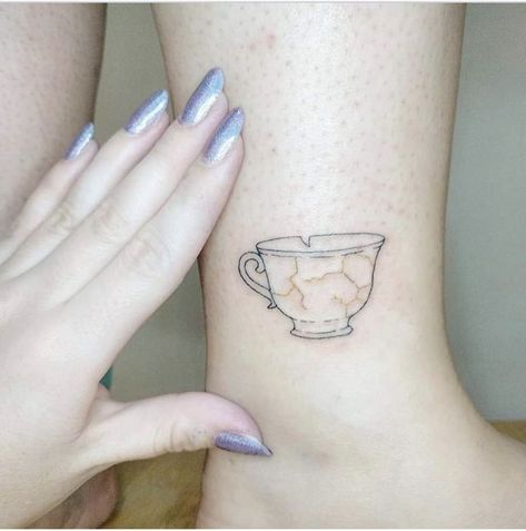 Kintsukuroi Tattoo, Kintsugi Tattoo Ideas, Kintsugi Tattoo, Teacup Tattoo, Minimal Tattoo Ideas, Bookish Tattoos, Peacock Feather Tattoo, Laser Removal, Coffee Tattoos