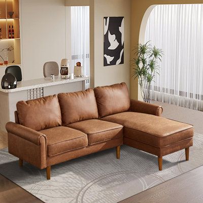 This setional sofa and chaise surface is made of soft fabric or textured suede fabric which offers you an enjoyable feeling. This sofa is not wrinkled easily, you can sit and lie on the sofa freely. Body Fabric: Brown Faux Leather, Orientation: Right Hand Facing | Brown Sectional - Winston Porter Kilis 2 - Piece Vegan Leather Sectional Faux Leather | 33.87 H x 81.51 W x 55.13 D in | Wayfair Faux Leather Couch, Faux Leather Sectional, Earthy Living Room, Brown Sectional, Leather Sectional Sofa, Living Room Organization, Leather Couch, Leather Sectional, Living Room Sectional