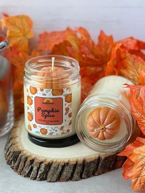 e958152b-a4fc-4c4f-94e9-43cb7a82efed Pumpkin spice soy candles on rustic wood slab with autumn leaves background. Cozy fall decor. | Sky Rye Design Nostalgic Fall, Silky Buttercream, 3d Pumpkin, Homemade Scented Candles, Pumpkin Spice Candle, Fall Candle Scents, Autumn Candle, Fall Fragrance, Creative Candles