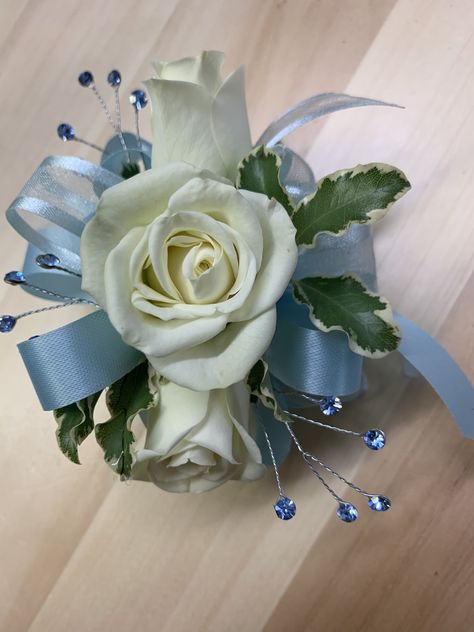 Light Blue Corsage And Boutonniere, Light Blue Corsage, Blue Corsage And Boutonniere, Prom Corsage Blue, Blue Corsage, White Dendrobium Orchids, Wrist Corsage Prom, White Spray Roses, Boutonnieres Prom