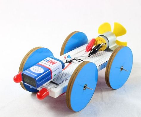 Electric Car with Fan Science Project at Home Diy Electric Toys, Car Repair Shop, Science Festival, Robotics Projects, Organizing Challenges, Marker Paper, Kids Electronics, Solar Projects, Double Tape