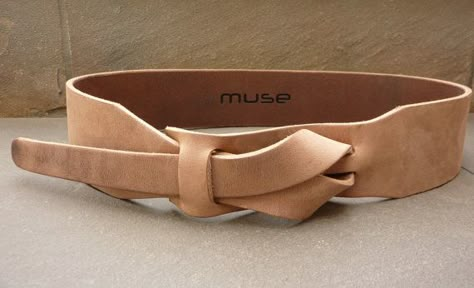 This is our Safari Outback Taupe rendition of the MUSE belt in a 2 inch/5 cm width. Safari Outback taupe will go well with Khakis, Dockers and jeans. A classic recreation of a 60's UNISEX nickel free belt design. Simple and comfortable, this one piece belt uses no metal buckle. Great for people with nickel allergies. Appealing to an individual who wants something different. Handmade of 100% leather. A must for frequent travelers,motorcyclists and musicians. Equestrian Belts, Handmade Leather Belt, Handmade Belts, Belt Brown, Belt Leather, Leather Art, Belt Design, Brown Brown, Brown Belt