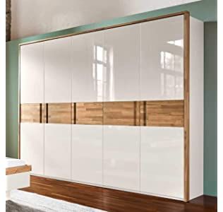 Vedika Interiors 3 Door with Light Walnut Finish Wardrobe (Brown): Amazon.in Wardrobe Laminate Design, Sliding Door Wardrobe Designs, Wardrobe Design Modern, Modern Cupboard, Armoire Dressing, Bedroom Cupboards, Modern Cupboard Design, Wardrobe Door Designs, Bedroom Cupboard Designs