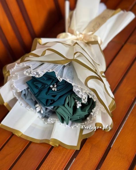 "A bouquet of style and warmth.🌸🤍" #bouquet #hijabbouquet #gift #foryou #fyp #explore #np #newpost Bow Bouquet, Bridal Shower, Shower, Flowers, Gifts, Quick Saves