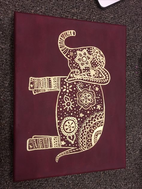 gold elephant with paint pens on maroon/burgundy canvas Maroon Painting Canvas, Maroon Painting, Henna Painting On Canvas, Henna Canvas Art, Maroon Bedroom, Henna Canvas, Maroon Abstract Painting, Burgundy Living Room, Royal Bedroom