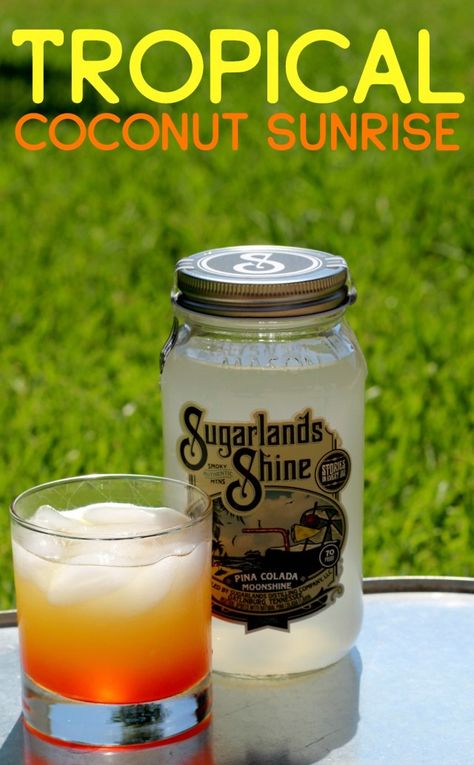 Tropical Coconut Sunrise Made with Sugarlands Shine Moonshine #ad #drink SugarlandsSummer Sugarlands Moonshine Recipes, Pina Colada Moonshine Recipe, Moonshine Cocktails Recipes, Moonshine Mixed Drinks, Moonshine Drinks, Moonshine Drink Recipes, Spiked Drinks, Alcoholic Recipes, Coconut Rum Drinks