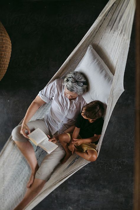 Happy grandma reading with grandson in hammock by Rob and Julia Campbell - Stocksy United Grandma Stock Photo, Happy Grandma, Grandma And Grandson, 2024 Vision, Grandchildren, Kids Playing, Hammock, Abc, Vision Board