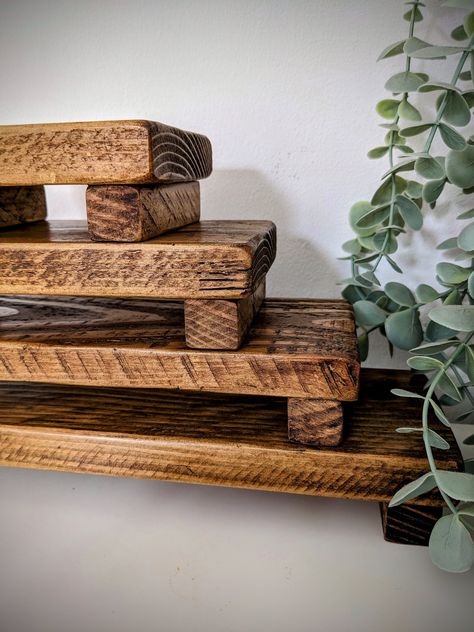 These handmade wooden countertop trays / risers are the perfect  way to display candles, plants, kitchen and bathroom items, or your crafts - you can use your imagination! Completely reclaimed, only using safe, environmentally sourced timber, finished in a lovely dark oak wax, that really brings out the beautiful grain.  A number of different sizes to suit whatever you want to display! Get a bargain by buying all options! NO EXTRA DELIVERY COST FOR MULTIPLE ITEMS! (UK) Small 12.5cm X 9.5 X 4.5cm Medium 20.5cm X 9.5 X 4.5cm Large 28cm X 9.5 X 4.5cm Extra-Large  35.5cm X 9.5 X 4.5cm Please note! All our products involve wood, a natural material that will move over time. Although we try our best, there may be shakes, knots, imperfections or gaps that appear when joining pieces. Countertop Tray, Wooden Risers, Plants Kitchen, Wood Projects For Beginners, Wood Art Projects, Reclaimed Wood Projects, Wooden Display, Easy Wood, Scrap Wood Projects