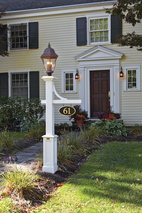 Looking for the ideal finishing touch to your entryway? A lamp post is a subtle yet beautiful addition to make your home even more appealing! #garden #gardendesign #lamppost #classiclamppost #customlamppost #classicstyle #seasonaldecor #summertime #summer #flowers #landscapedesign #outdoorspaces #outdoorliving #outdoordesign #gardenenvy #newenglandstyle #newenglandcharm #walpoleoutdoors #liveoutsideexpectations Address Sign Post, Old Wood Signs, Mailbox Landscaping, Address Post, Mailbox Posts, Outdoor Lamp Posts, Driveway Entrance, Lantern Post, New England Style