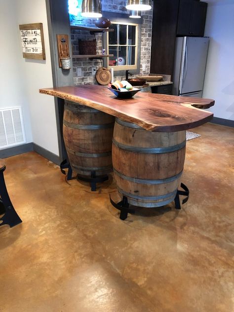 Single Slab Walnut live edge bar top on top of whiskey barrels Wine Barrel Ideas, Live Edge Bar Top, Whiskey Barrel Bar, Deco Cinema, Whiskey Barrel Table, Wine Barrel Bar, Live Edge Bar, Wine Barrel Table, Barrel Ideas