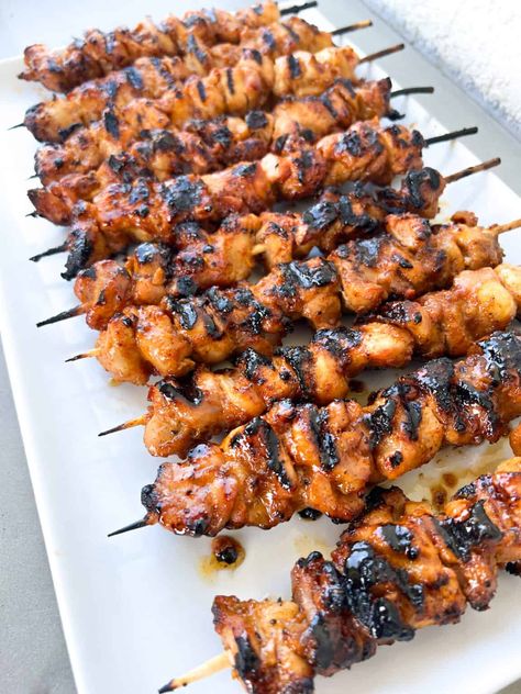 Chicken thighs are used on chicken skewers being being grilled to perfection. They are great for parties and entertaining. Chicken Thigh Skewers, Chicken Skewers Marinade, Chicken Skewers Grilled, Skewers On The Grill, Sour Cream Potato Salad, Chicken Spiedini, Grilled Pineapple Recipe, Chicken Kabob Recipes, Sweet Chili Chicken