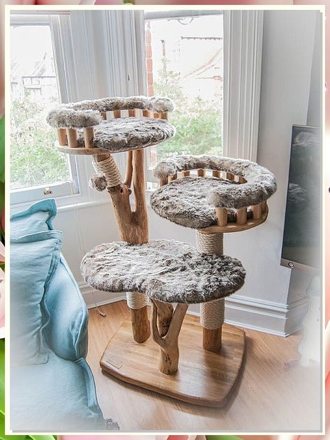 Looking to upgrade your feline friend's playtime? Check out our stylish cat tree that will keep your kitty entertained for hours. This cat tree is perfect for climbing, scratching, and lounging. Give your cat the ultimate playground with our sleek and modern design. Cat Tree Ideas, Cat Trees Homemade, Custom Cat Trees, Diy Cat Scratcher, Unique Cat Trees, Wooden Cat Tree, Cool Cat Trees, Cat Tree House, Diy Cat Tree