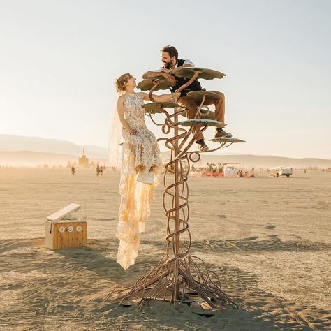 Posting more Burning Man wedding pics In honor of getting tickets today 😍 ⠀⠀⠀⠀⠀⠀⠀⠀⠀ Want to get married at Black Rock City? I have special packages for the big event. Hit me up and let’s make some plays magic together. ⠀⠀⠀⠀⠀⠀⠀⠀⠀ See you out there! . . . . . #burningman #burningmanstyle #burningmanart #burningman2023 #burningmanphotos #burningmanwedding #burningmanweddings #blackrockcity #blackrockdesert #ttitd #nevadaweddingphotographer #nevadawedding #nevadaweddings #nevadaweddingvideogra... Burning Man Wedding Theme, Burning Man Themed Wedding, Burning Man Wedding, Burning Man Installation, Burning Man Vehicles, Burning Man Structures, Nevada Wedding, Instagram Posting, Burning Man Art