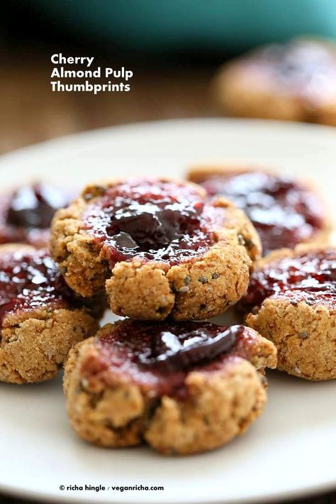 Cherry Almond Thumbprint Cookies - Almond Pulp Cookies - Vegan Richa Almond Thumbprint Cookies, Almond Pulp Recipes, Pulp Recipe, Vegan Christmas Cookies, Oil Free Vegan Recipes, Vegan Richa, Cherry Almond, Thumbprint Cookies, Vegan Christmas