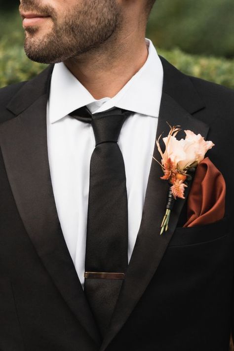 Black Tux With Terracotta, Black Suit Rust Tie Wedding, Black Tux With Copper Tie, Black Suit With Copper Tie, Black Suit Terracotta Wedding, Black Suit With Burnt Orange Tie, Black And Terracotta Groomsmen, Fall Groom Tuxedo, Black Tux Fall Wedding