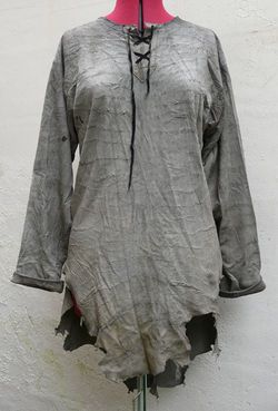 Definitely thinking something like this for the base layer. Possibly sleeveless so ragged around armholes too. Rags Clothing, Apocalypse Fashion, Medieval Tunic, Fantasy Garb, Larp Costume, Gray Tunic, Distressed Shirt, Fantasy Costumes, Bohemian Look