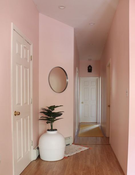 This pink entryway is an extension of a blogger's bohemian living room. The paint color is Baby Soft by Clare. #bohemian #boho #bohodecor #bohohomedecor #bohemiandecor #eclecticdecor Blush Wall Color Bedroom, Peach Hallway, Pink Wall Room Ideas, Dark Pink Walls, Pink Wall Painting Ideas, Pink Walls Living Room, Small Hallway Paint Colors, Pink Living Room Paint, Coral Pink Room