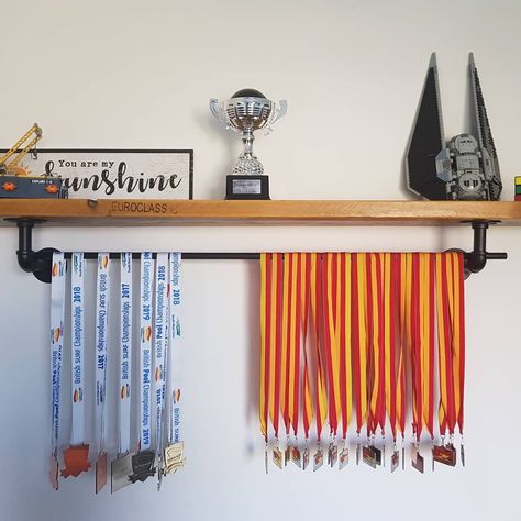 Reclaimed scaffolding board shelf complete with medal holder Medal Shelf, Hang Medals Ideas, Medal And Trophy Display Ideas, Medal Organizer Ideas, Medal Holder Ideas Diy, Medal Board, Medal Holder Diy, Medal Holder Ideas, Medal Display Ideas Diy