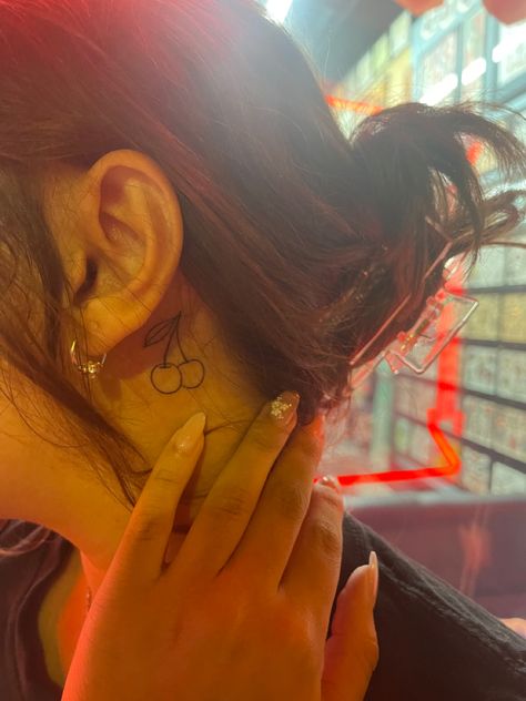 Korean Idol Tattoo, Cherry Neck Tattoo, Cherry Tattoo Placement Ideas, Cherry Behind Ear Tattoo, Cherry Tattoo Behind Ear, Little Cherry Tattoo, Cherry Bow Tattoo, Cherry Tattoo Placement, Cute Cherry Tattoo