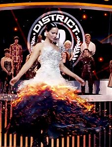 Catching Fire: My favorite part, hands down.. That gorgeous wedding dress.. And Katniss as the Mockingjay Katniss Wedding Dress, Fire Dress, Die Tribute Von Panem, Volunteer As Tribute, Jay Dress, Mocking Jay, Hunger Games Movies, I Volunteer As Tribute, The Hunger Games Catching Fire