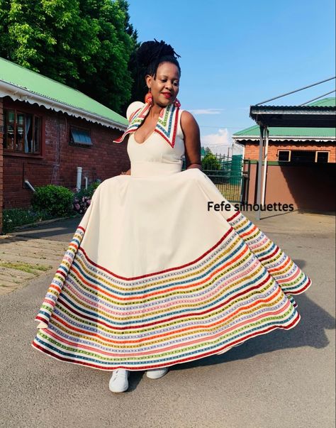 Designed by fefe silhouttes Mbhaco Designs, Pedi Traditional Dresses, Makoti Outfits, Pedi Traditional Attire, Xhosa Traditional Attire, Ma Design, Xhosa Attire, South African Traditional Dresses, African Print Jumpsuit