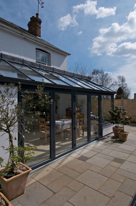 https://flic.kr/p/czQ7iA | Lean-to  Extension | Because all Apropos lean to conservatories are individually designed to meet your requirements, we can accommodate any unusual features within your home. For example, a lean to conservatory is ideal for homes with low ceilings, when the view from a first floor window may be obscured by a high, pitched roof, or single storey buildings with limited room under the eaves. Lean to conservatories are also a very practical solution when space is at a ... Lean To Extension, Lean To Conservatory, Conservatory Extension, Curved Pergola, Garden Room Extensions, Lean To, Room Extensions, Glass Extension, Sunroom Designs