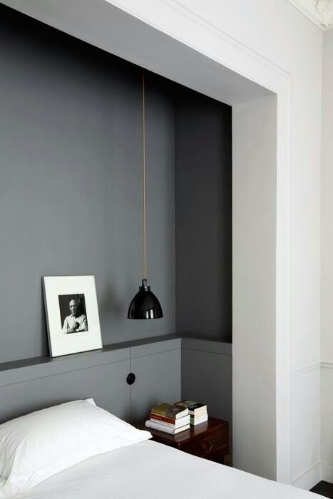 Here, the head of the bed is recessed into a little 'room' created for that purpose. Storage along the sides of the bed niche allows for a place to stash stuff, and a ledge provides a home for art. Design Ložnic, Bed Nook, Dekorasi Kamar Tidur, Diy Headboard, Shelves In Bedroom, Paris Apartments, Design Del Prodotto, Style At Home, Hangzhou