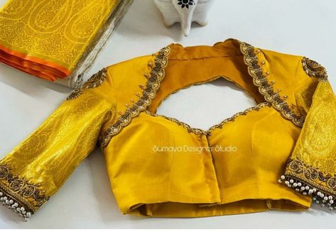 15 Breathtaking bridal blouse designs to amp your kanchipuram wedding saree look! Wedding Saree Look, Blouse Maggam Work, Blouse Designs High Neck, Latest Bridal Blouse Designs, Maggam Work Blouse, Zardosi Work, Aari Blouse, New Saree Blouse Designs, Wedding Saree Blouse Designs