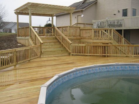 Prefab Above Ground Pool Decks | The large pool deck above includes room for moving around the deck ... Wood Pool Deck, Wooden Deck Designs, Deck Design Plans, Above Ground Pool Deck Ideas, Above Ground Pool Deck, Multi Level Deck, Pool Decking, Pool Deck Plans, Swimming Pool Decks