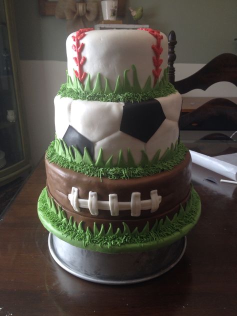 Football And Baseball Cake, Soccer And Baseball Cake, Sports Cakes For Boys Birthdays Kids, Sporty Birthday Cake, All Star Sports Birthday Cake, Baseball Cake Ideas, Multi Sports Birthday Cake, Sports Birthday Cakes, Baseball Birthday Cakes