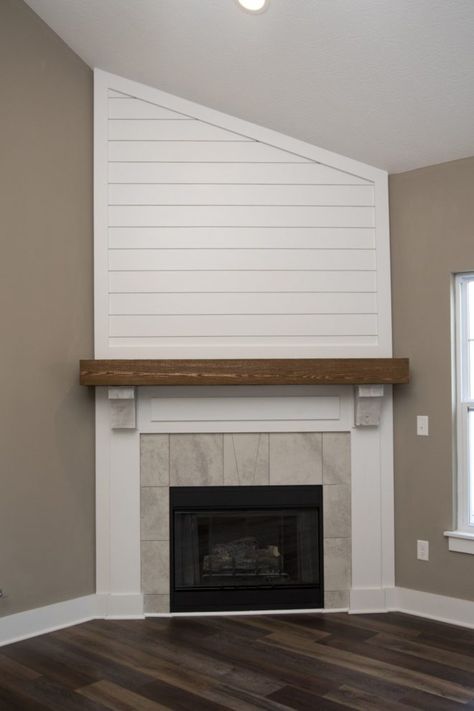 Shiplap Fireplace with Wood Mantel - Joyner Homes Corner Shiplap Fireplace, Shiplap Fireplace With Wood Mantle, Beach House Fireplace, Corner Fireplace Makeover, Diy Fireplace Mantle, Wood Mantle Fireplace, House Fireplace, Fireplace Redo, Mantle Ideas