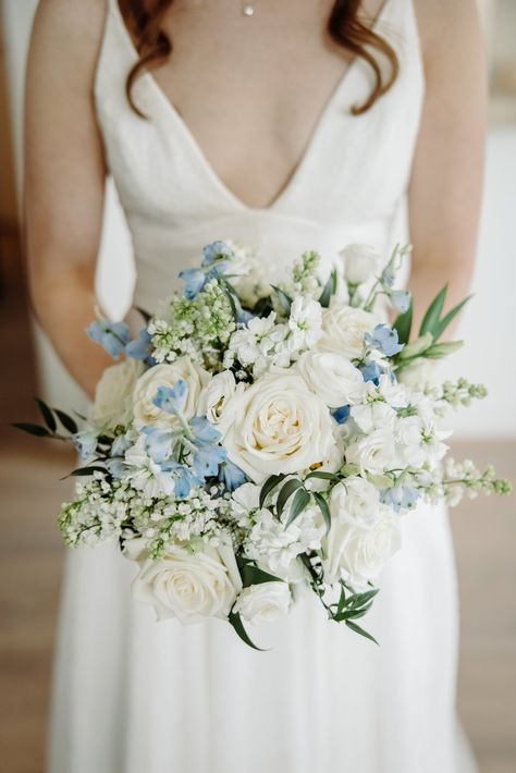 Bluegrass Chic | Classic White & Light Blue Wedding at The Alfond Inn light blue bridal bouquet Dusty Blue Wedding Floral Arrangements, Bride Bouquet Dusty Blue, Blue Wedding Theme Bouquet, Light Blue Bride Bouquet, French Blue Wedding Bouquet, White Bridal Bouquet With Blue Accents, White And Light Blue Wedding Bouquet, Bride Bouquets Blue And White, Wedding Bouquets With Blue Flowers