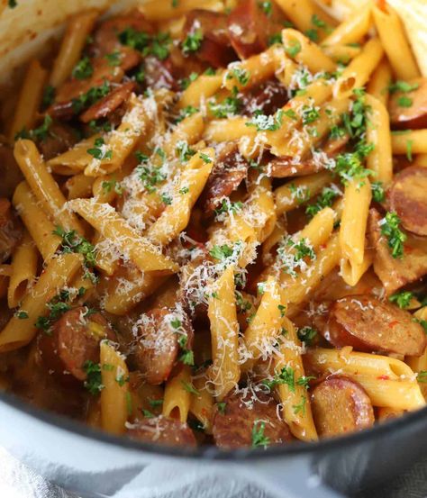 This Kielbasa Pasta is a Cheesy One Pot meal that is ready in just 30 minutes for the best weeknight dinner. It's filled with flavor from the smoky sausage and roasted red peppers to the creamy pasta! Kielbasa And Pasta Recipes, Kielbasa Pasta Recipes, Kilbasa Sausage Recipes, Gouda Recipe, Sausage And Peppers Pasta, Kielbasa Pasta, Polska Kielbasa, Sausage Recipes For Dinner, Sausage Dinner